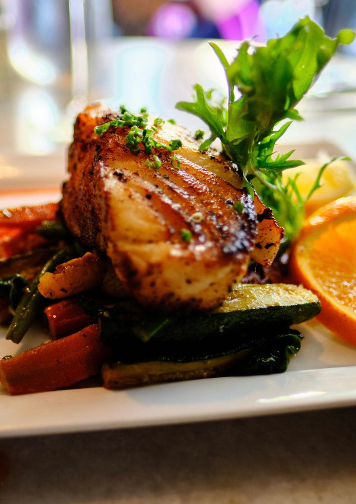sea bass with mango-garlic butter